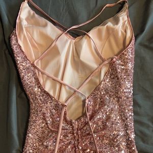 long pink sparkly prom dress with a  beautiful slit on the left leg